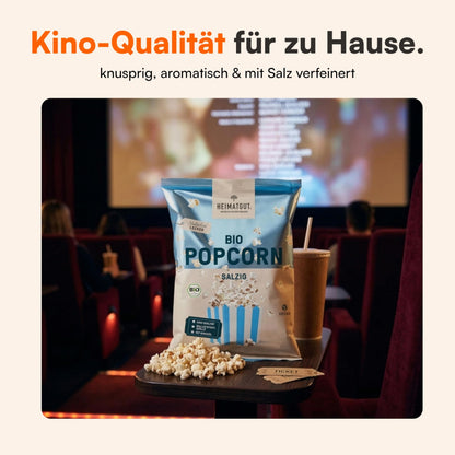 Bio Popcorn Salzig im Kinosessel neben einem Getränk
